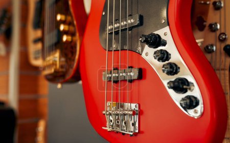 Foto de Close-up of an electric guitar in a musical instrument store. Hobbies and recreation. - Imagen libre de derechos
