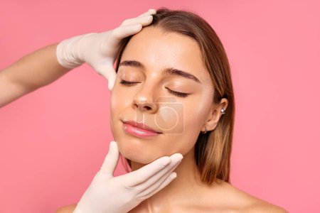 A woman in a spa is having a facial treatment with microdermabrasion and an exfoliating scrub, looking relaxed and serene. The session is part of her skincare routine for glowing, smooth skin