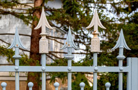 iron spear heads at a garden fence of a villa in the spa community of Bath Voeslau in Lower Austria, Austria
