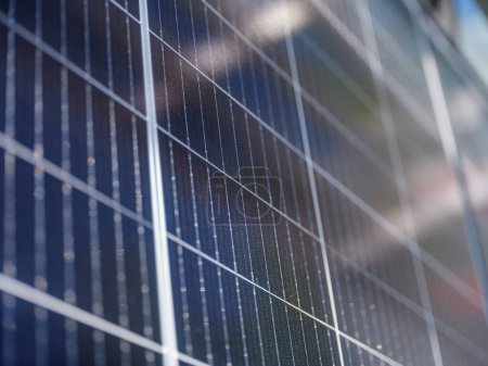 Photo for Solar panel grid closeup in bright summer sun on the roof - Royalty Free Image