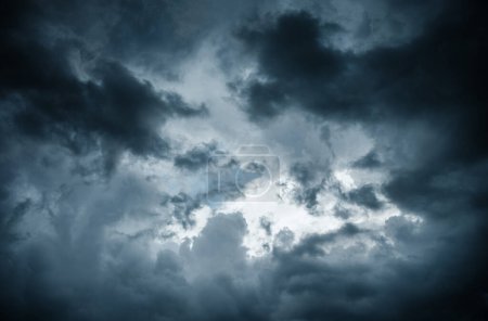 white storm clouds in summer with blue sky background contrasty texture