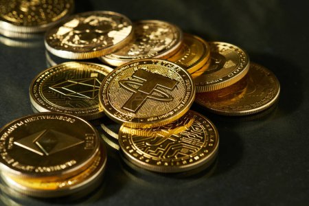 Closeup of Tether cryptocurrency surrounded by other cryptocurrencies