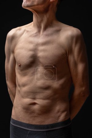 Foto de Still life. Studio shot of a mature man posing shirtless - Imagen libre de derechos