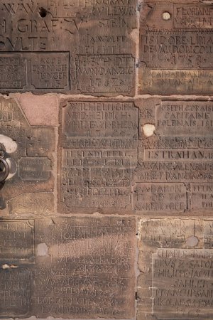 Photo for Strasbourg, France - 06 26 2023: Strasbourg cathedral: Detail of the walls on the roof of the cathedral with graffiti carved in stone - Royalty Free Image