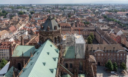 Photo for Strasbourg, France - 06 26 2023: Strasbourg cathedral: View of the roof of the cathedral and the city around from the top - Royalty Free Image