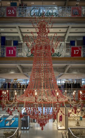 Photo for Paris, France - 12 06 2023: Village Saint Honore. View of a chrismas decorations at the entrance Hall of the passage - Royalty Free Image