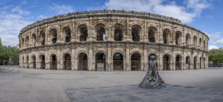 Photo for Nimes, France - 04 17 2024: View of the Pradier fountain and the Sainte Perptue Church behind - Royalty Free Image