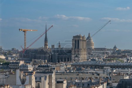 Paris, France - 05 09 2024: Notre Dame de Paris. Panoramic view of the renovation site with scaffolding of Notre-Dame cathedral from Beaubourg