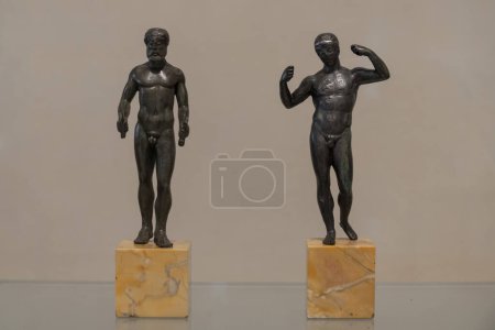Paris, France - 05 10 2024: Sport in Antiquity. View of bronze statuettes of winning's athletes