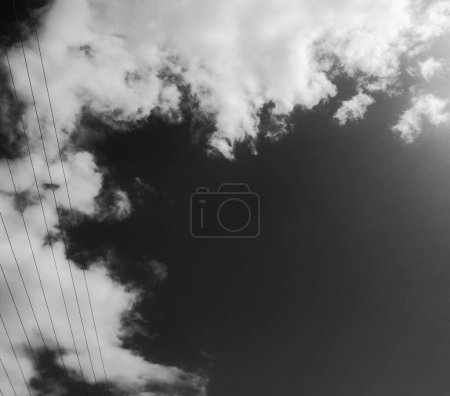 Dramatic Skyline with Silhouetted Power Lines - A Monochrome Perspective of Nature Meets Technology