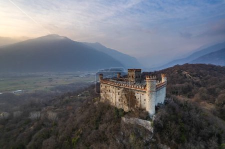Aerial view of the castle of Montalto Dora on Craver Mount in winter. Ivrea, Piedmont, Italy
