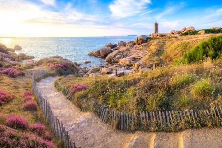 Lighthouse of Ploumanach at the golden hour in Perros-Guirec, Cotes dArmor, Brittany, France. High quality photo