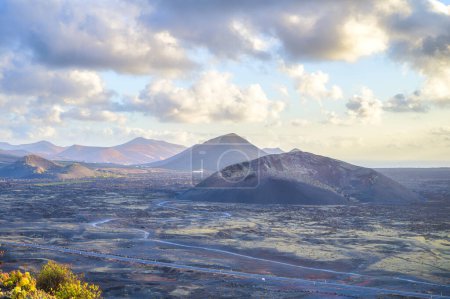 A stunning view of the volcanic landscape of El Cuervo vulcan at sunset, Lanzarote, Canary Island, Spain.