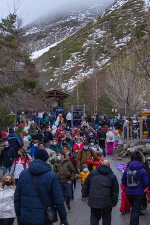 Photo for SIERRA NEVADA, Spain - February 05, 2022: View of crowds walking through Sierra Nevada Ski Resort. - Royalty Free Image