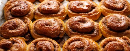 Photo for Close up view of cinnamon sweet rolls. Delicious traditional yeast buns - Royalty Free Image
