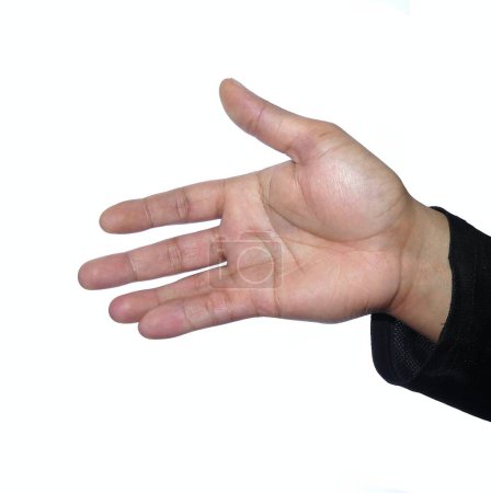 Téléchargez les photos : Nombre : Une main ouverte isolée sur un fond blanc, présente une difformité congénitale appelée syndactylie, où deux doigts sont reliés par la peau - en image libre de droit