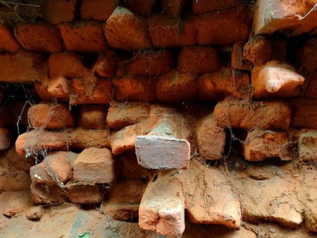 Weathered Walls Red bricks Broken Bricks and decayed Bricks in a wall RED Broken Wall Bricks