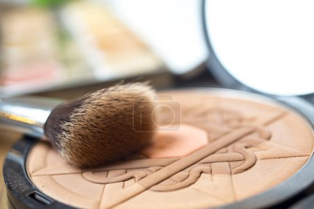 Photo for Makeup brush on a makeup powder - Royalty Free Image
