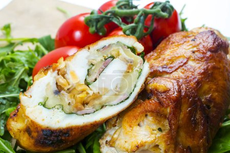 Photo for Rolled chicken. Stuffed chicken fillet with vegetables - Royalty Free Image