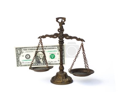 Foto de Balanzas legales con dinero en efectivo de un dólar - Imagen libre de derechos
