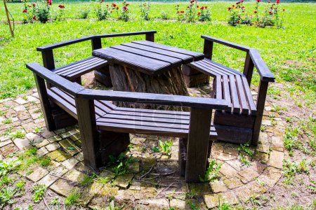 Photo for Empty picnic table and chairs - Royalty Free Image