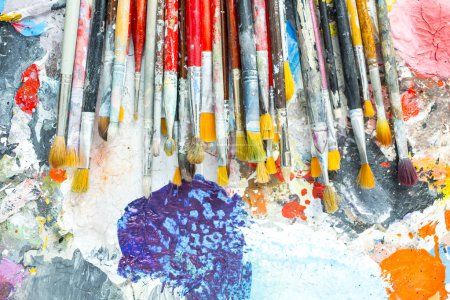 Photo for Oil paints and paint brushes on a palette - Royalty Free Image