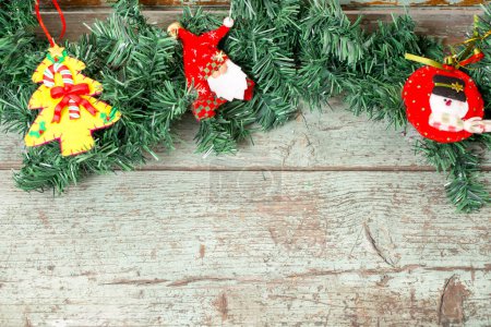 Photo for Christmas wooden background with fir tree branches - Royalty Free Image