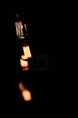 Photo for Luxury retro light bulb decor on a black background - Royalty Free Image