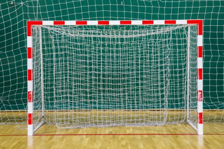 Photo for Football goal with the red and white goalpost in the hall - Royalty Free Image