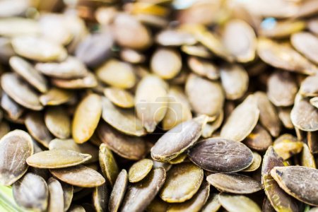Photo for Pumpkin seeds in glass jar - Royalty Free Image