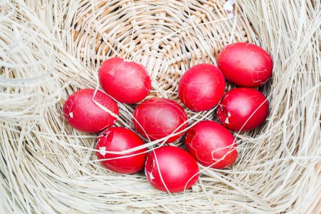 Photo for Easter broken red eggs in nest - Royalty Free Image