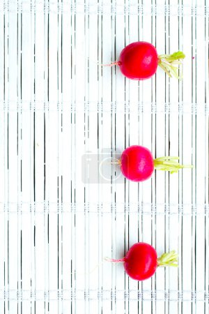 Photo for Small garden radishes isolated on white background cutout - Royalty Free Image