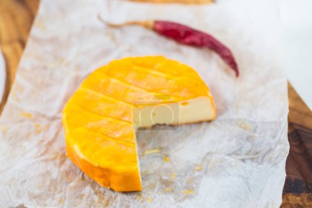 Photo for Orange moldy cheese and chili pepper - Royalty Free Image