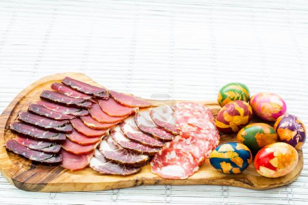Photo for Appetizer with Easter eggs on wooden board - Royalty Free Image