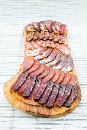 Photo for Meat appetizer on wooden board - Royalty Free Image