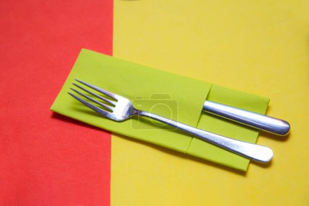 Photo for Knife and fork at napkin - Royalty Free Image