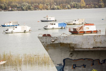 Photo for Set of different boats in the river - Royalty Free Image