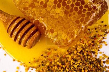 Téléchargez les photos : Peigne miel et drizzler fermer - en image libre de droit
