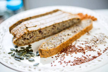 Photo for Homebaked Healthy Wholegrain Bread on plate - Royalty Free Image