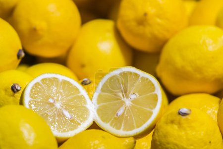 Photo for Colorful Display Of Lemons In Market - Royalty Free Image
