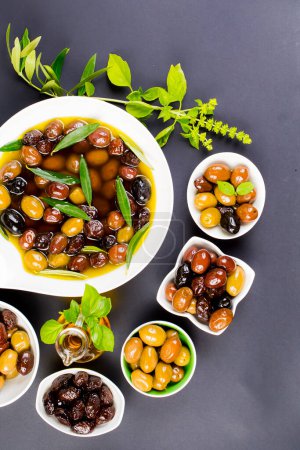Photo for Olives and olive oil on table - Royalty Free Image