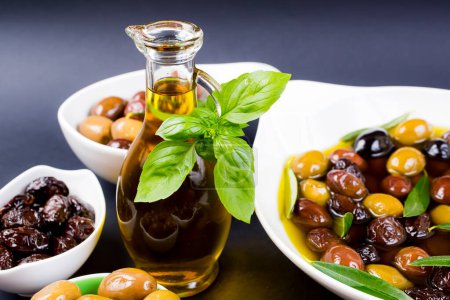 Photo for Olives and olive oil on table - Royalty Free Image