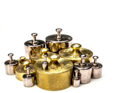 Photo for Set of precision weights for a balance scale - Royalty Free Image
