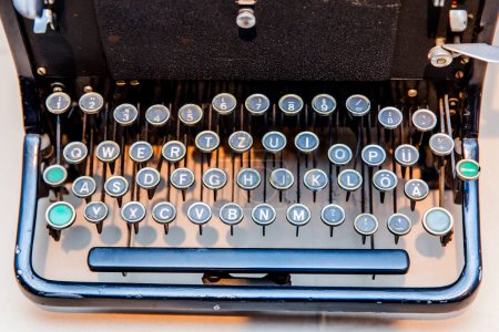 Photo for Details of an old retro typewriter, vintage style, dusty surfaces. - Royalty Free Image