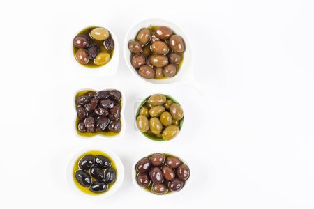 Photo for Olives in a bowls on a white background - Royalty Free Image