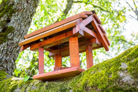 Photo for Wooden birdhouse on the tree - Royalty Free Image