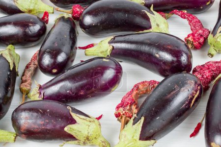 Photo for Heap of fresh eggplants on white background - Royalty Free Image