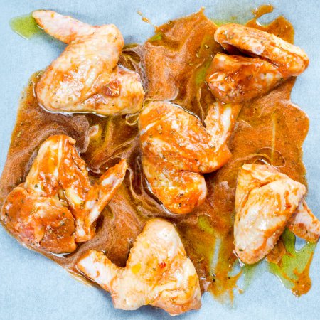 Photo for Chicken wings in the marinade - Royalty Free Image