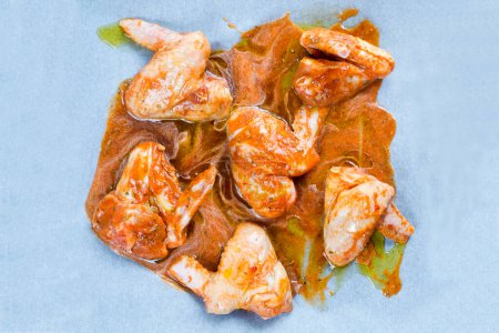 Photo for Chicken wings in the marinade - Royalty Free Image