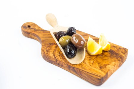 Photo for Marinated olives with lemon in a small dish - Royalty Free Image